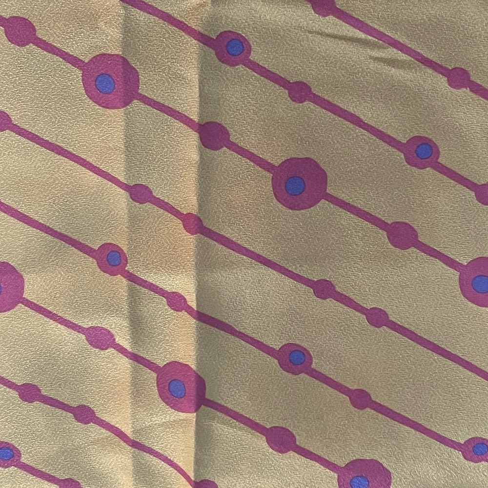 Japanese scarf with golden yellow and pink print.